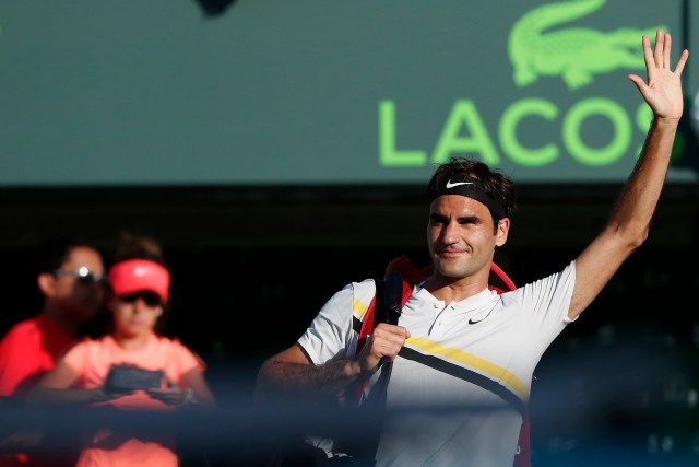 Mar 24, 2018; Key Biscayne, FL, USA; Roger Federer of Switzerland waves to the crowd while leaving the court after his match against Thanasi Kokkinakis of Australia (not pictured) on day five of the Miami Open at Tennis Center at Crandon Park. Kokkinakis won 3-6, 6-3, 7-6(4). Mandatory Credit: Geoff Burke-USA TODAY Sports