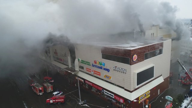 Still photo taken from video provided by Russian Emergencies Ministry shows a site of a fire at a shopping mall in Kemerovo, Russia March 25, 2018. Russian Emergencies Ministry/Handout via REUTERS. ATTENTION EDITORS - THIS IMAGE WAS PROVIDED BY A THIRD PARTY. NO RESALES. NO ARCHIVE. TPX IMAGES OF THE DAY