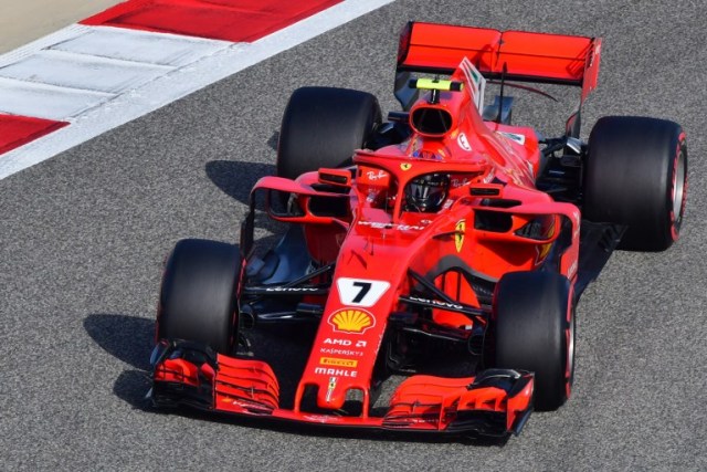 Ferrari's German driver Sebastian Vettel steers his car during the third practice session on April 7, 2018, prior to the qualifiers for the Bahrain Formula One Grand Prix at the Sakhir circuit in Manama. / AFP PHOTO / GIUSEPPE CACACE
