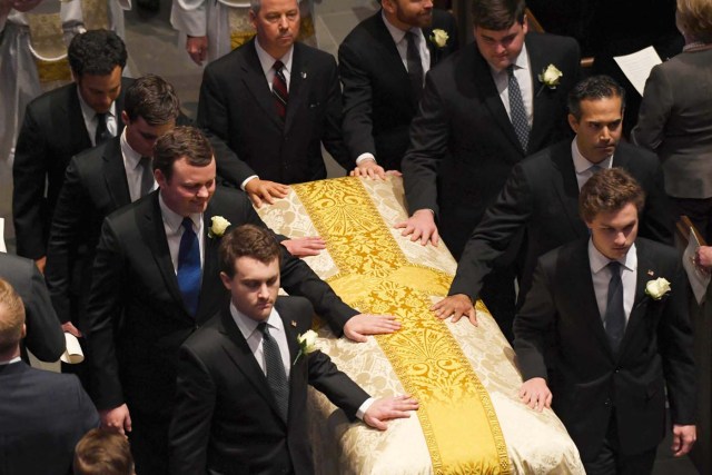 Bush grandsons and pallbearers exit following the funeral mass for their grandmother former US First Lady Barbara Bush at St. Martin's Episcopal Church on April 21, 2017, in Houston Texas. / AFP PHOTO / POOL / Jack Gruber