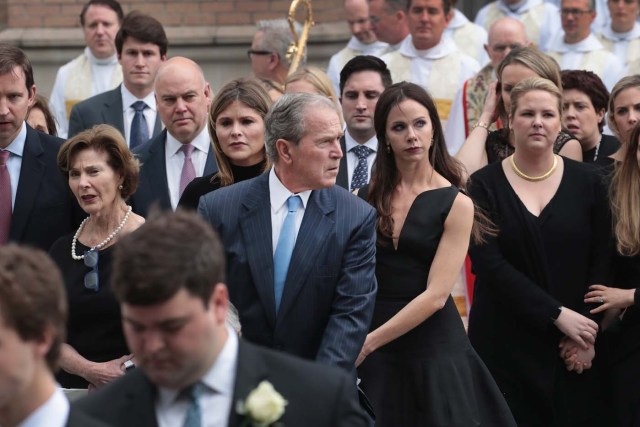 HOUSTON, TX - APRIL 21: Former president George W. Bush and family follow as the remains of former first lady Barbara Bush are carried from St. Martin's Episcopal Church following her funeral service on April 21, 2018 in Houston, Texas. Bush, wife of former president George H. W. Bush and mother of former president George W. Bush, died at her home in Houston on April 17 at the age of 92. Scott Olson/Getty Images/AFP