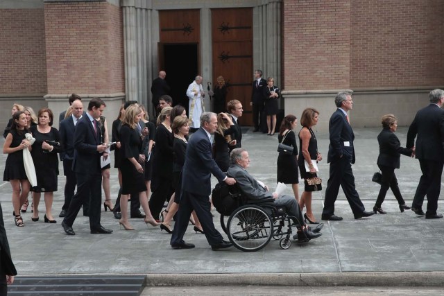 HOUSTON, TX - APRIL 21: Former president George H.W. Bush and son, former president George W. Bush and family leave St. Martin's Episcopal Church following the funeral service for former first lady Barbara Bush on April 21, 2018 in Houston, Texas. Bush, wife of former president George H. W. Bush and mother of former president George W. Bush, died at her home in Houston on April 17 at the age of 92.   Scott Olson/Getty Images/AFP