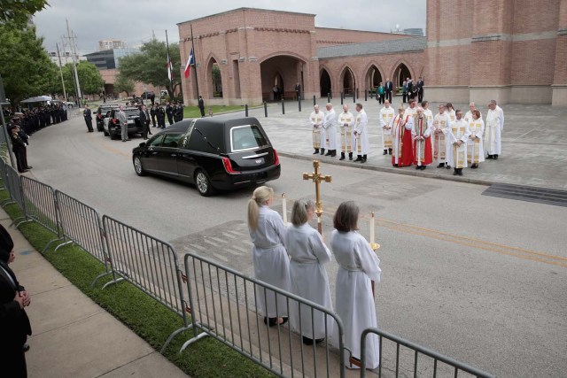 HOUSTON, TX - APRIL 21: The remains of former first lady Barbara Bush leave St. Martin's Episcopal Church following her funeral service on April 21, 2018 in Houston, Texas. Bush, wife of former president George H. W. Bush and mother of former president George W. Bush, died at her home in Houston on April 17 at the age of 92. Scott Olson/Getty Images/AFP