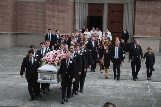 HOUSTON, TX - APRIL 21: The remains of former first lady Barbara Bush are carried from St. Martin's Episcopal Church following her funeral service on April 21, 2018 in Houston, Texas. Bush, wife of former president George H. W. Bush and mother of former president George W. Bush, died at her home in Houston on April 17 at the age of 92. Scott Olson/Getty Images/AFP