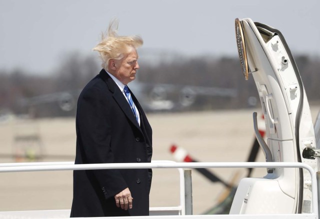 U.S. President Donald Trump boards Air Force One before departing Joint Base Andrews, Maryland en route West Virginia, U.S., April 5, 2018. REUTERS/Kevin Lamarque