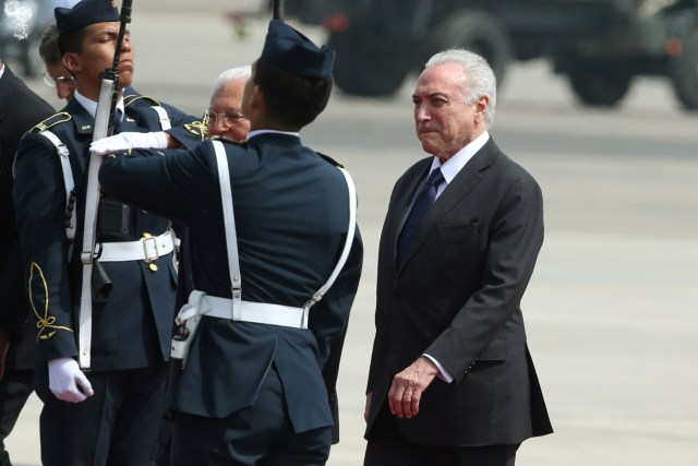 Brazil's President Michel Temer arrives at the airport for upcoming Summit of the Americas in Lima, Peru April 13, 2018. REUTERS/Guadalupe Pardo