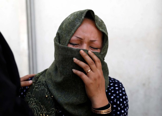 A woman mourns at a hospital after a suicide attack in Kabul, Afghanistan April 22, 2018.REUTERS/Mohammad Ismail