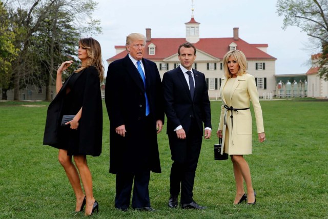 U.S. President Donald Trump and first lady Melania Trump and French President Emmanuel Macron and Brigitte Macron prepare to have their picture taken on a visit to the estate of the first U.S. President George Washington in Mount Vernon, Virginia outside Washington, U.S., April 23, 2018. REUTERS/Jonathan Ernst