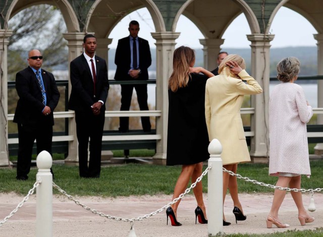 U.S. first lady Melania Trump (3rd R) and Brigitte Macron, wife of French President Emmanuel Macron (2nd R) are led on a visit to the estate of the first U.S. President George Washington in Mount Vernon, Virginia outside Washington, U.S., April 23, 2018. REUTERS/Jonathan Ernst
