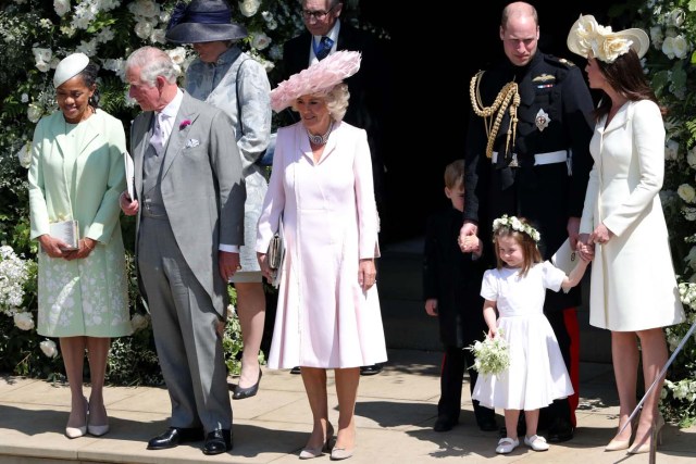 (L-R) Meghan Markle's mother Doria Ragland, Britain's Prince Charles, Prince of Wales, Britain's Camilla, Duchess of Cornwall, Britain's Prince William, Duke of Cambridge, Princess Charlotte of Cambridge and Britain's Catherine, Duchess of Cambridge, leave after attending the wedding ceremony of Britain's Prince Harry, Duke of Sussex and US actress Meghan Markle at St George's Chapel, Windsor Castle, in Windsor, on May 19, 2018. / AFP PHOTO / POOL / Andrew Matthews