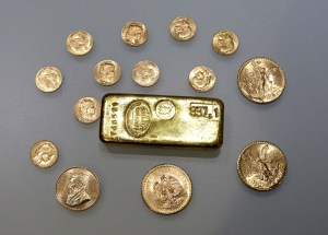 Precios del oro suben tras débil dato inflación de EEUU