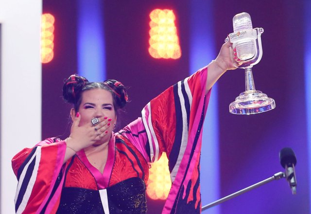 REFILE - CORRECTING DATE   Israel's Netta reacts as she wins the Grand Final of Eurovision Song Contest 2018 at the Altice Arena hall in Lisbon, Portugal, May 12, 2018.  REUTERS/Pedro Nunes