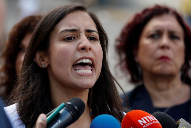 Patricia Ceballos, wife of jailed former mayor Daniel Ceballos, talks to the media outside a detention center of the Bolivarian National Intelligence Service (SEBIN), where a riot occurred, according to relatives, in Caracas, Venezuela May 16, 2018. REUTERS/Carlos Garcia Rawlins