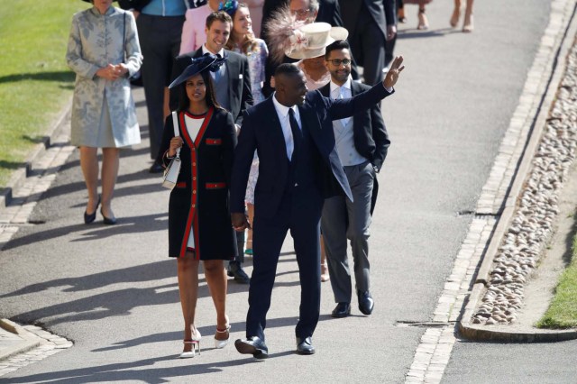 British actor Idris Elba arrives with his fiancee Sabrina Dhowre for the wedding ceremony of Britain's Prince Harry, Duke of Sussex and US actress Meghan Markle at St George's Chapel, Windsor Castle, in Windsor, Britain, May 19, 2018. Odd ANDERSEN/Pool via REUTERS