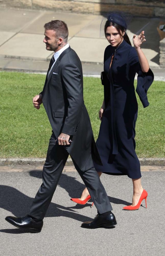 David and Victoria Beckham arrive at St George's Chapel in Windsor Castle for the wedding of Prince Harry and Meghan Markle in Windsor, Britain, May 19, 2018. Andrew Milligan/Pool via REUTERS