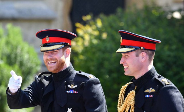 Prince Harry walks with his best man, the Duke of Cambridge, as he arrives at St George's Chapel at Windsor Castle for his wedding to Meghan Markle in Windsor, Britain, May 19, 2018. Brian Lawless/Pool via REUTERS