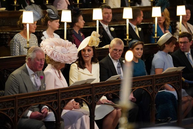 The Duchess of Cornwall, the Duchess of Cambridge, the Duke of York, Princess Beatrice, Princess Eugenie and Jack Brooksbank take their seats in St George's Chapel at Windsor Castle ahead of the wedding of Prince Harry and Meghan Markle in Windsor, Britain, May 19, 2018. Jonathan Brady/Pool via REUTERS