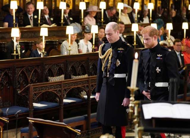 Prince Harry (right) and his best man, the Duke of Cambridge, take their seats in St George's Chapel at Windsor Castle ahead of the wedding of Prince Harry and Meghan Markle. Saturday May 19, 2018. Jonathan Brady/Pool via REUTERS