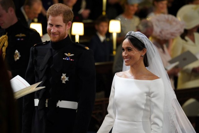 Prince Harry and Meghan Markle in St George's Chapel at Windsor Castle during their wedding service in Windsor, Britain, May 19, 2018. Jonathan Brady/Pool via REUTERS