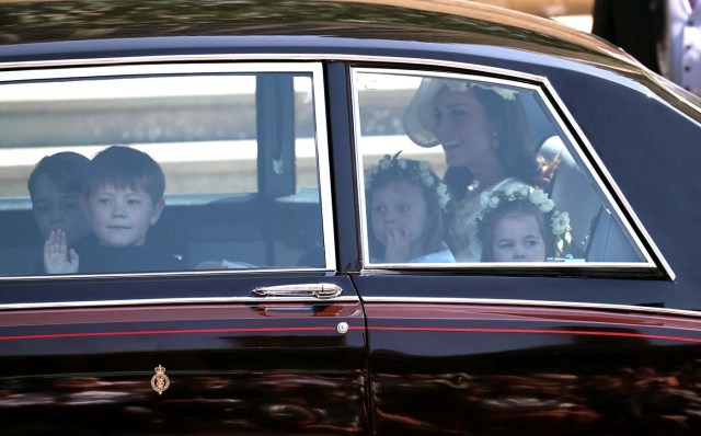 The Duchess of Cambridge arrives with Prince George and Princess Charlotte at St George's Chapel at Windsor Castle for the wedding of Prince Harry and Meghan Markle in Windsor, Britain, May 19, 2018. Jane Barlow/Pool via REUTERS