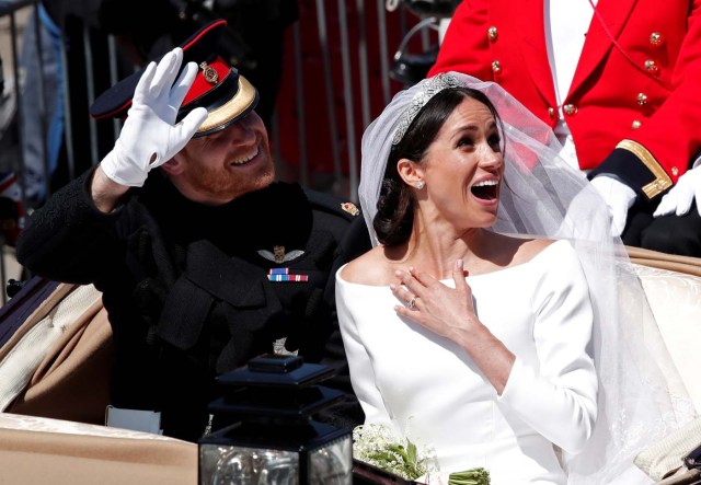 El príncipe Enrique, nieto de la reina Isabel de Inglaterra, se casa con la actriz Meghan Markle en el castillo de Windsor, Inglaterra. 19 de mayo de 2018. REUTERS/Benoit Tessier