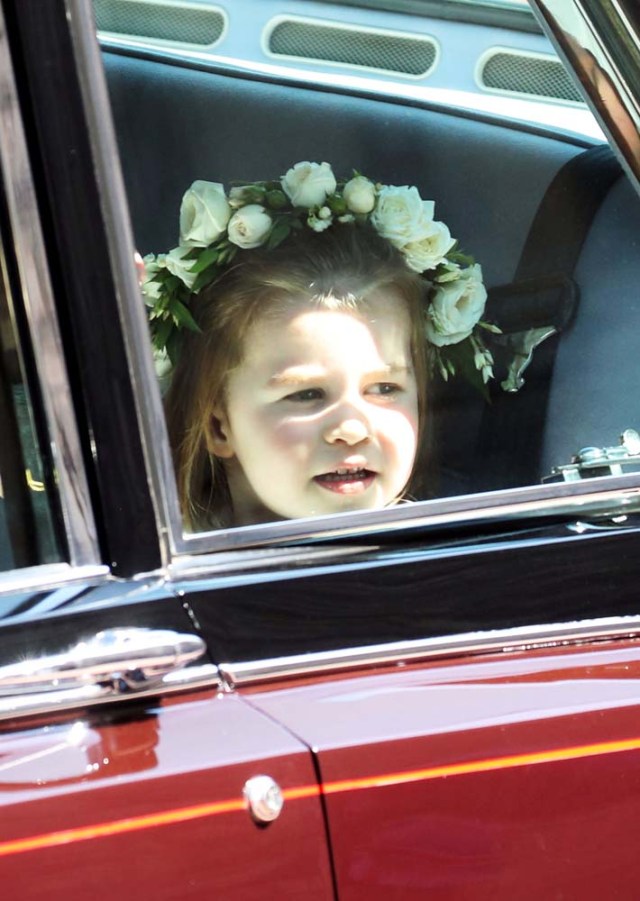Princess Charlotte of Cambridge arrives at the wedding of Prince Harry to Ms Meghan Markle at St George's Chapel, Windsor Castle in Windsor, Britain, May 19, 2018. Chris Jackson/Pool via REUTERS