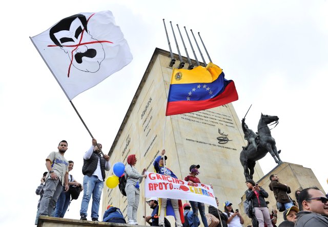 Venezuelan citizens living in Colombia protest against the presidential elections in Venezuela, in Bogota, Colombia May 20, 2018. REUTERS/Carlos Julio Martinez