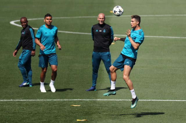 Soccer Football - Champions League - Real Madrid Training - Real Madrid City, Madrid, Spain - May 22, 2018   Real Madrid coach Zinedine Zidane, Cristiano Ronaldo and Casemiro during training   REUTERS/Sergio Perez