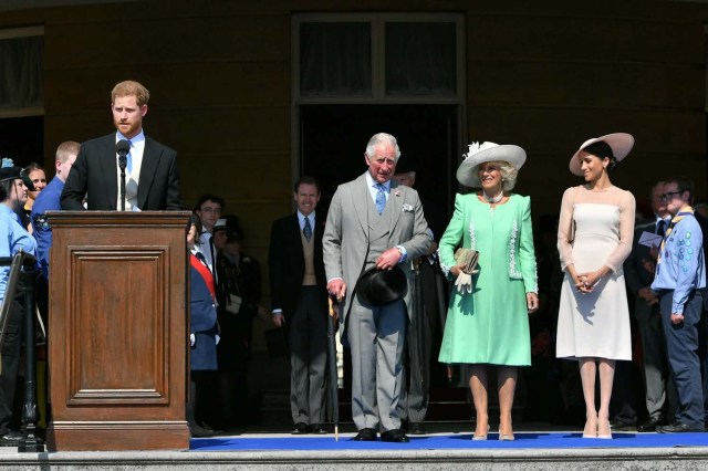 Britain'sÊPrince Harry and his wife Meghan, Duchess of Sussex, at a garden party at Buckingham Palace with Prince Charles and Camilla the Duchess of Cornwall, their first royal engagement as a married couple, in London, May 22, 2018. Dominic Lipinski/Pool via Reuters