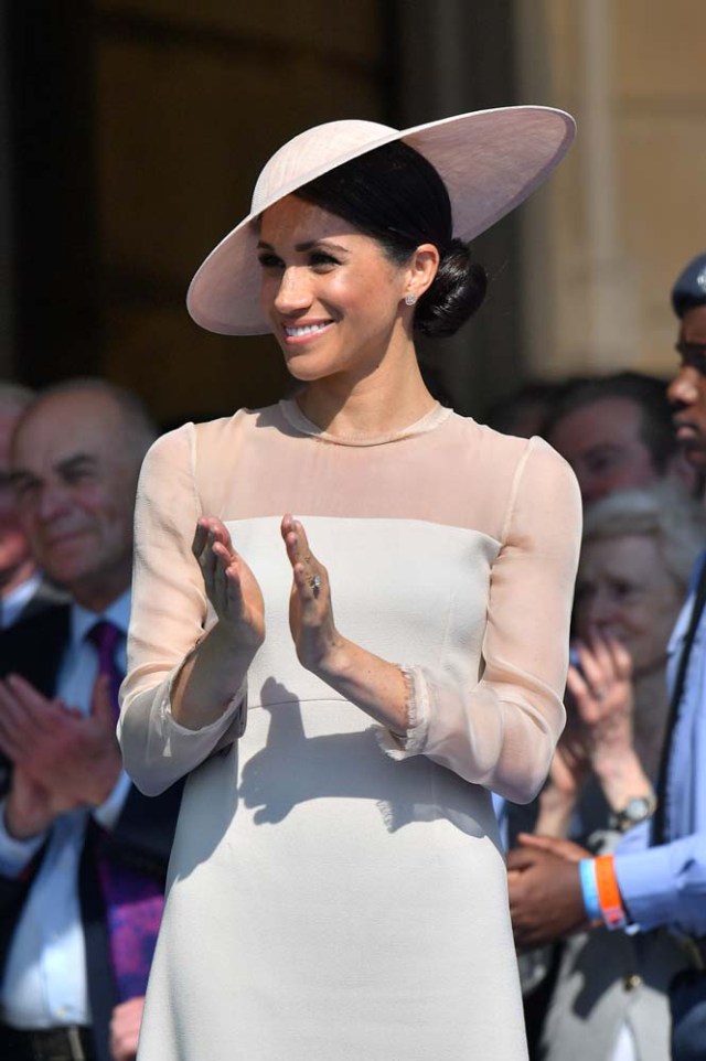 Meghan, Duchess of Sussex attends a garden party at Buckingham Palace, in London, Britain May 22, 2018. Dominic Lipinski/Pool via Reuters