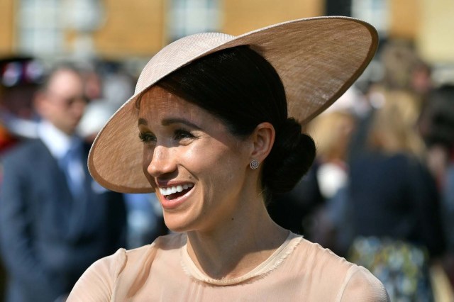 Meghan, Duchess of Sussex attends a garden party at Buckingham Palace, in London, Britain May 22, 2018. Dominic Lipinski/Pool via Reuters