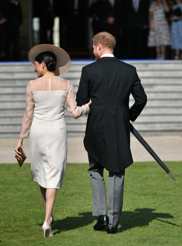 Britain'sÊPrince Harry and his wife Meghan, Duchess of Sussex attend a garden party at Buckingham Palace, their first royal engagement as a married couple, in London, May 22, 2018. Dominic Lipinski/Pool via Reuters