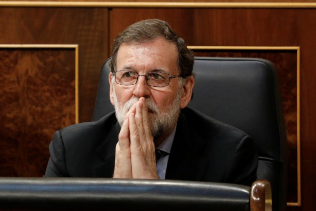 El primer presidente de España, Mariano Rajoy, asiste a una sesión plenaria presupuestaria de 2018 en el Parlamento en Madrid, España, el 23 de mayo de 2018. REUTERS / Paul Hanna