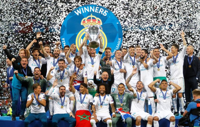 Soccer Football - Champions League Final - Real Madrid v Liverpool - NSC Olympic Stadium, Kiev, Ukraine - May 26, 2018 Real Madrid celebrate with the trophy after winning the Champions League REUTERS/Kai Pfaffenbach