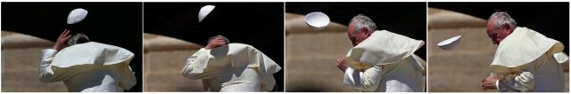  El Papa Francisco pierde su gorra del cráneo durante la audiencia general del miércoles en la plaza de San Pedro en el Vaticano, el 13 de junio de 2018. REUTERS / Tony Gentile
