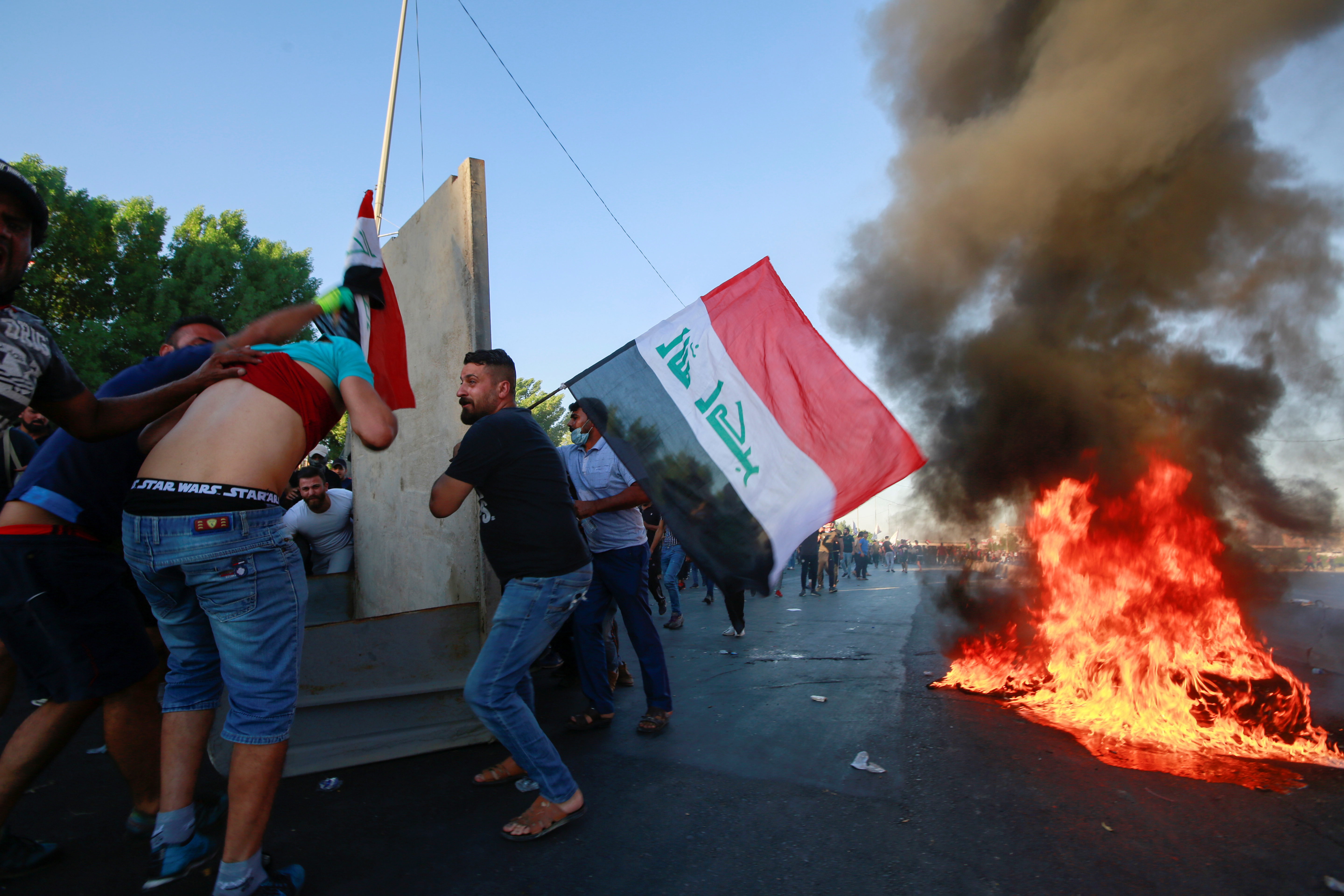 Suben a 93 los muertos y casi 4.000 heridos tras 4 días de protestas en Irak (Fotos)