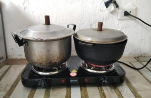 Venezolanos compran cocinas eléctricas para enfrentar la escasez del gas