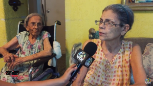 Madre e hija en silla de ruedas luchan para sobrevivir en una Maracaibo infectada (Video)