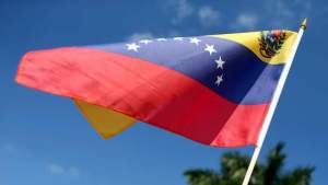 Venezuelan village mourns 23 drownings, seeks those missing