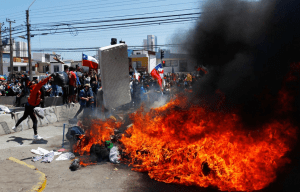 “Gritan cosas feas”: Migrantes venezolanos, temerosos tras feroces protestas en Chile