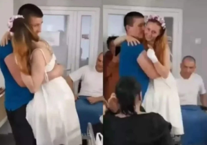 Video: perdió las piernas por una mina rusa y “baila” en su boda en los brazos de su esposo