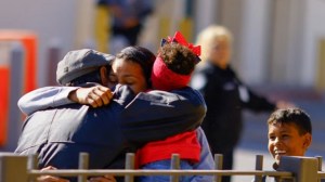 Survivor of México detention fire and his family cross into U.S.