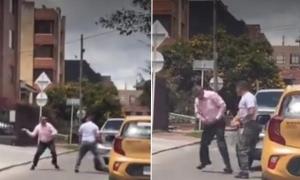 Con correa en mano, taxista y conductor protagonizaron pelea en plena calle (VIDEO)