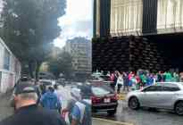 Ministerio Público entregó alimentos a los jubilados bajo un palo de agua en Caracas (FOTOS)